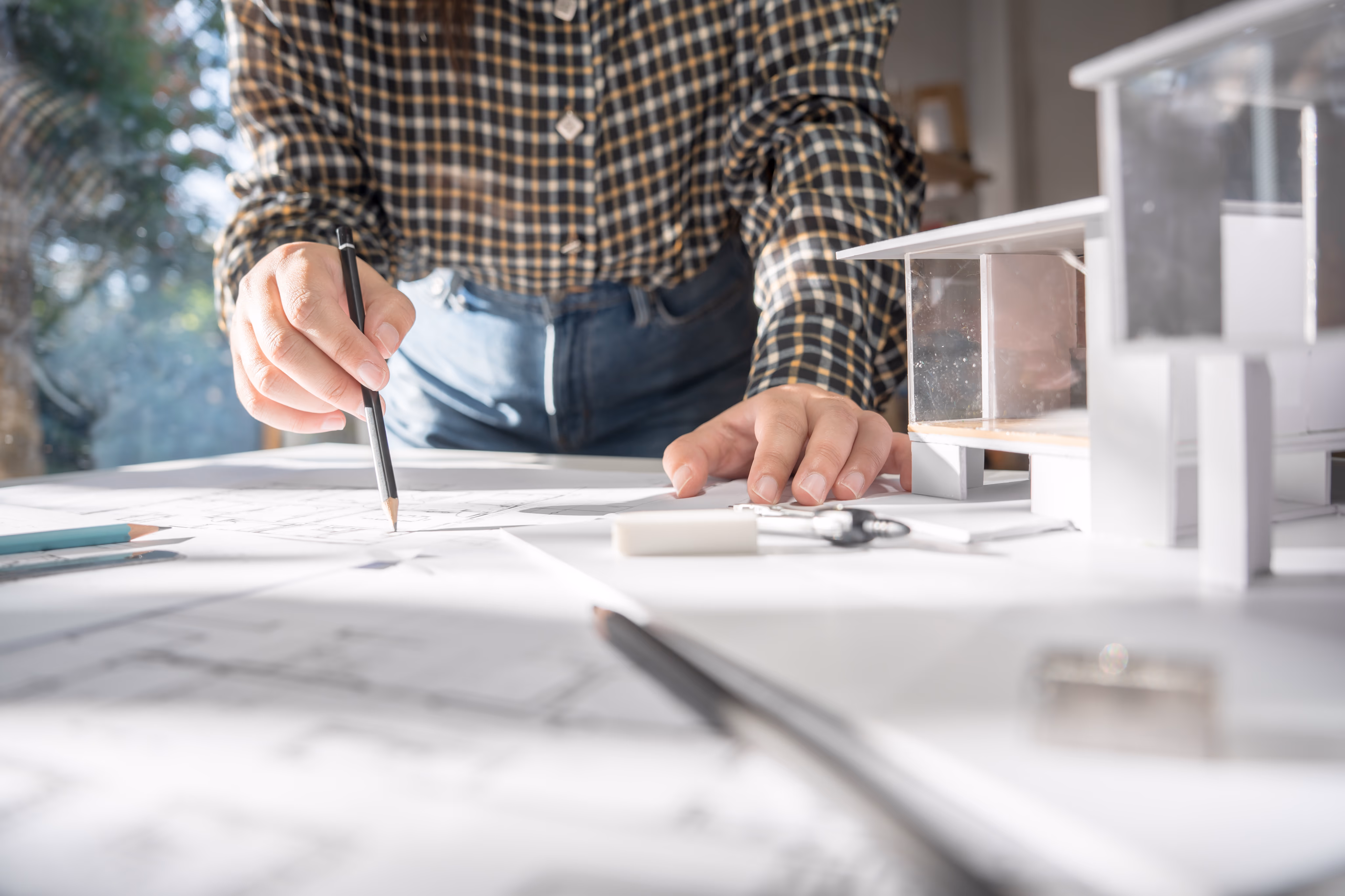 Reviewing home plans and details with clients