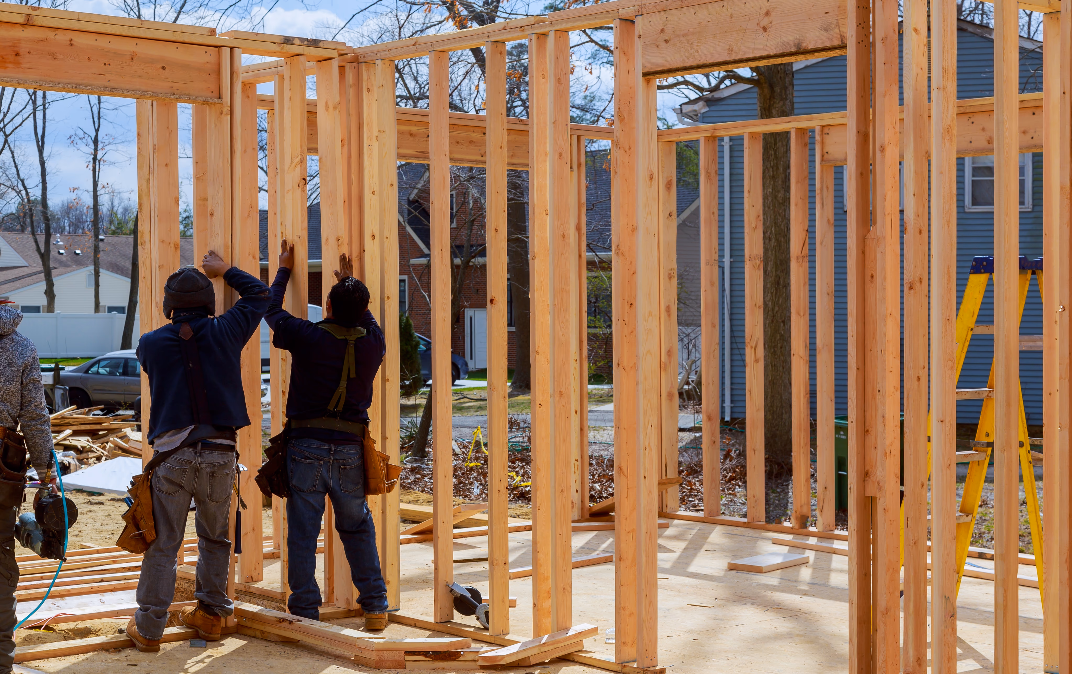 Active construction site with framing underway